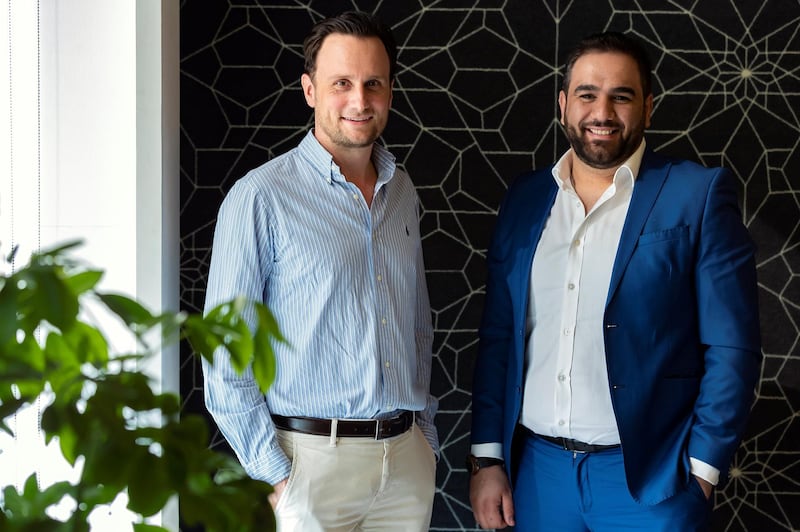 Dubai, United Arab Emirates - July 16, 2019: FlexxPay is a way for employees to access part of their salary in between pay cheques. The online platform was co-founded by Dubai entrepreneurs Michael Truschler (L) and Charbel Nasr. Tuesday the 16th of July 2019. Dubai Mall, Dubai. Chris Whiteoak / The National