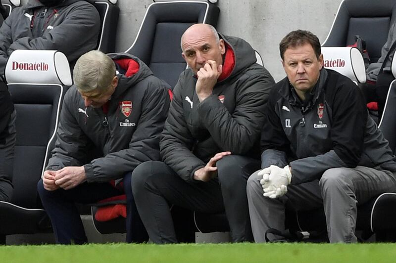 Soccer Football - Premier League - Brighton & Hove Albion vs Arsenal - The American Express Community Stadium, Brighton, Britain - March 4, 2018   Arsenal manager Arsene Wenger and assistant manager Steve Bould look dejected    Action Images via Reuters/Tony O'Brien    EDITORIAL USE ONLY. No use with unauthorized audio, video, data, fixture lists, club/league logos or "live" services. Online in-match use limited to 75 images, no video emulation. No use in betting, games or single club/league/player publications.  Please contact your account representative for further details.