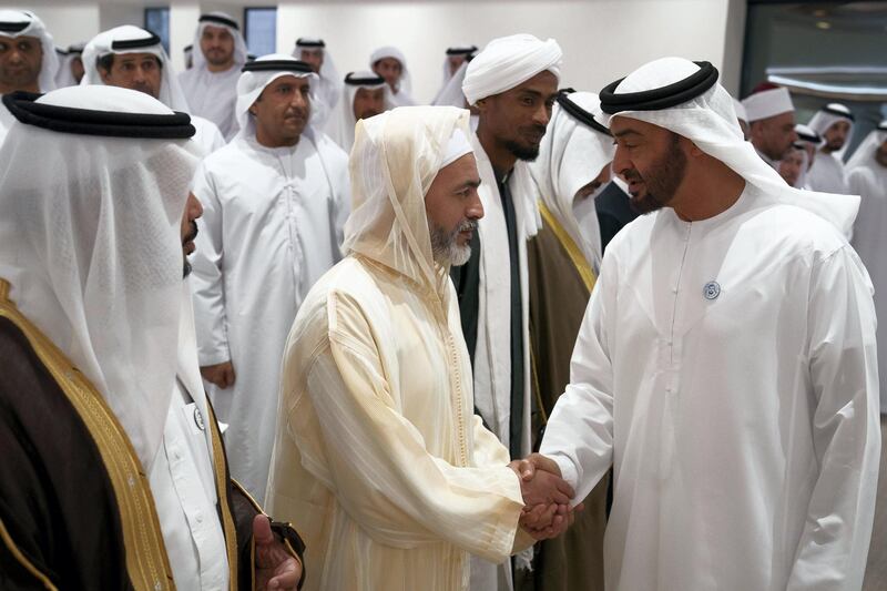 ABU DHABI, UNITED ARAB EMIRATES - May 21, 2018: HH Sheikh Mohamed bin Zayed Al Nahyan Crown Prince of Abu Dhabi Deputy Supreme Commander of the UAE Armed Forces (R), receives a guest of HH Sheikh Khalifa bin Zayed Al Nahyan, President of the UAE and Ruler of Abu Dhabi, prior to a lecture by Omar Habtoor Al Darei titled "Reclaiming Religion In The Age of Extremism", at Majlis Mohamed bin Zayed. 

( Hamad Al Kaabi / Crown Prince Court - Abu Dhabi )
---