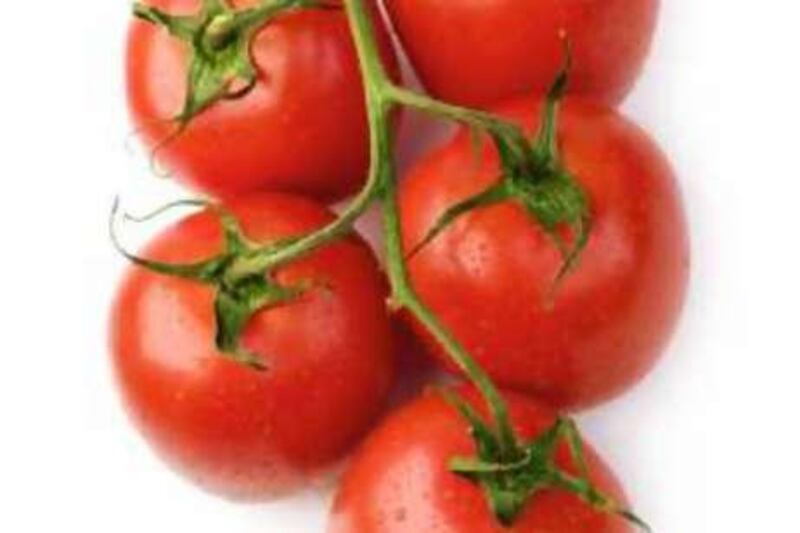 Photo of a tomato bunch. 