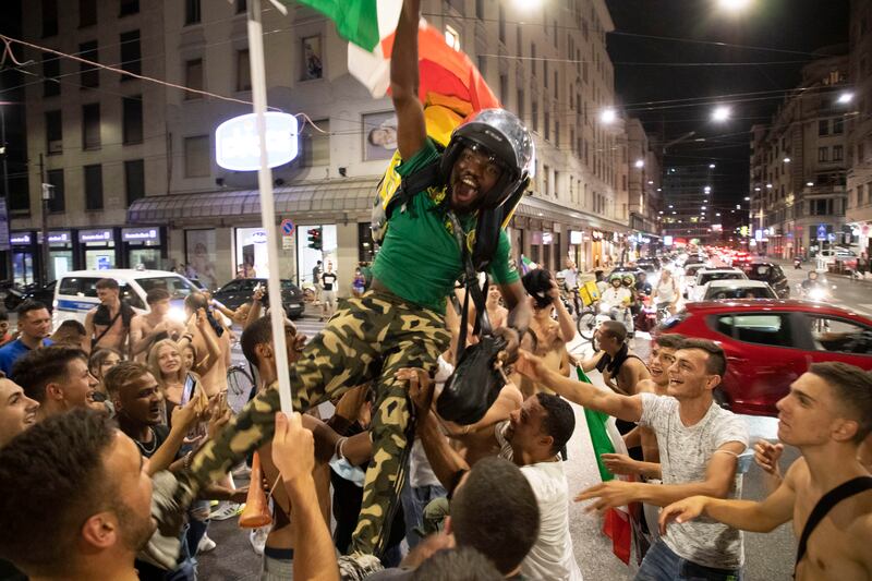 Celebrations among Italy fans in Milan.