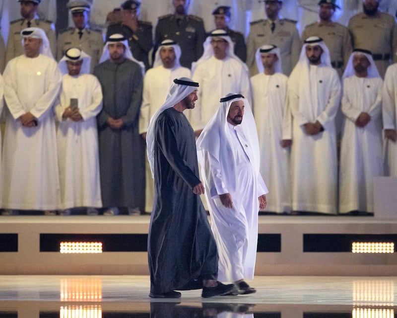 ABU DHABI, UNITED ARAB EMIRATES - November 30, 2019: HH Sheikh Mohamed bin Zayed Al Nahyan, Crown Prince of Abu Dhabi and Deputy Supreme Commander of the UAE Armed Forces (center L), speaks with HH Dr Sheikh Sultan bin Mohamed Al Qasimi, UAE Supreme Council Member and Ruler of Sharjah (center R), during a Commemoration Day ceremony at Wahat Al Karama, a memorial dedicated to the memory of UAE’s National Heroes in honour of their sacrifice and in recognition of their heroism.
( Ryan Carter / Ministry of Presidential Affairs )