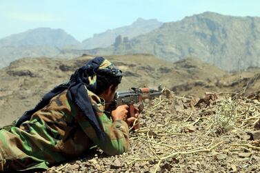 A member of Yemeni pro-government forces takes part in military operations on Houthi positions in the southern province of Dhalea in Yemen EPA