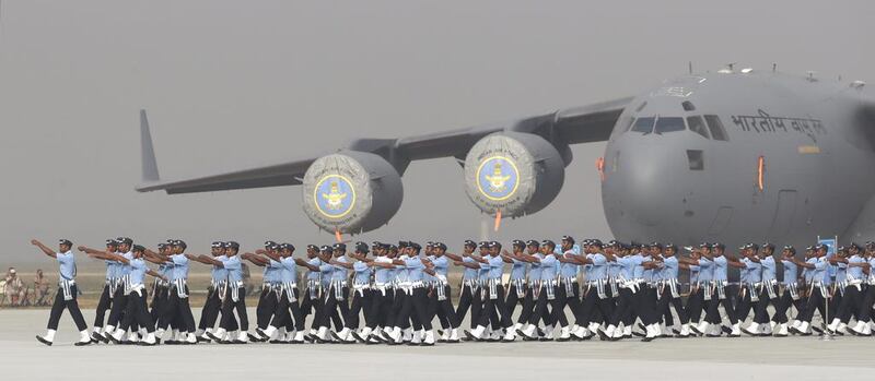 Indian soldiers march past their C-17 Globemaster military transport aircraft during the air force day parade at the Hindon air base on the outskirts of New Delhi. Manish Swarup / AP Photo