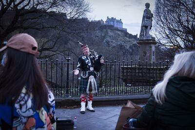 A bagpiper on Edinburgh's Princes Street. Photo: Jane Barlow