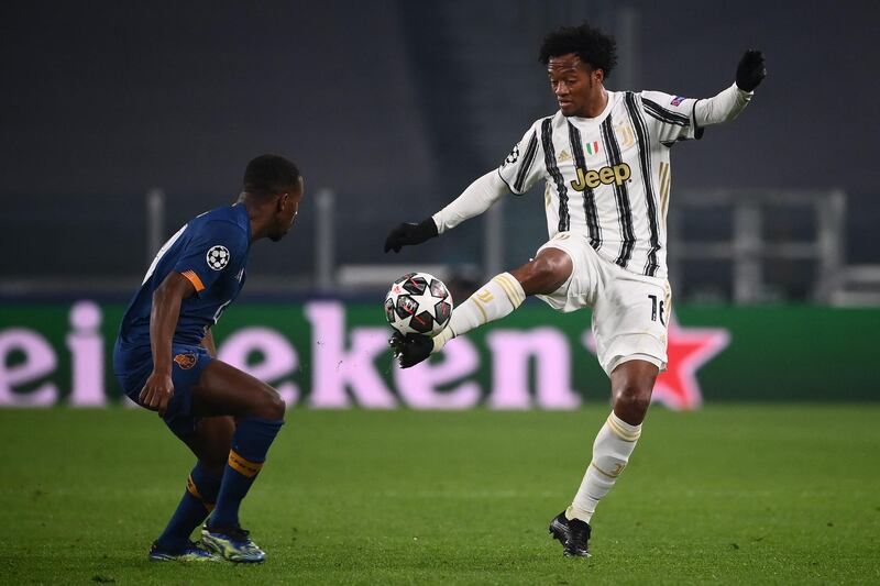 Right midfielder: Juan Cuadrado (Juventus) - Is there a more precise crosser anywhere right now? After his sixth assist of the Champions League season against Porto, he can only wish some illustrious teammates could have matched his standards. AFP