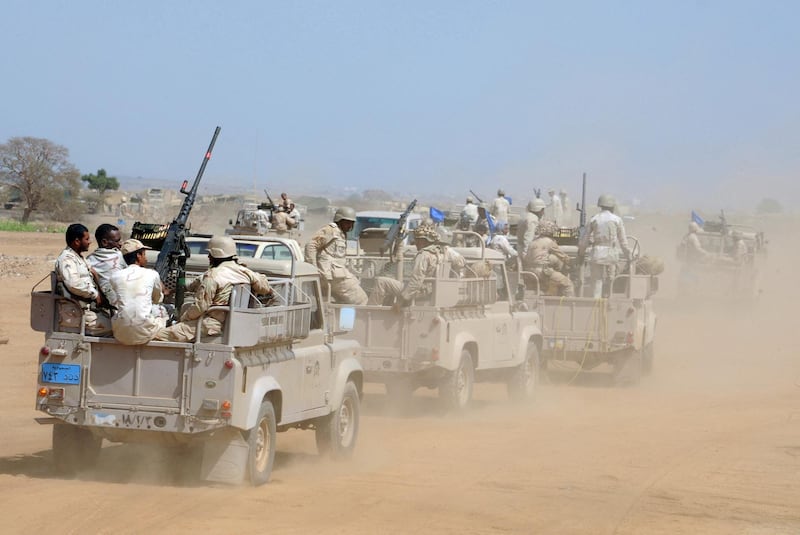 (FILES) -- File picture dated November 8, 2009 shows Saudi soldiers deploying near the border with Yemen in the desert region of Khuba, about 60 kilometres (35 miles) inland from the Red Sea coast, in the southern Saudi province of Jizan. Shiite rebels in northern Yemen accused Saudi forces of launching a major cross-border ground and air attack on November 23, a day after an alleged failed incursion. AFP PHOTO/STR (Photo by AFP FILES / AFP)