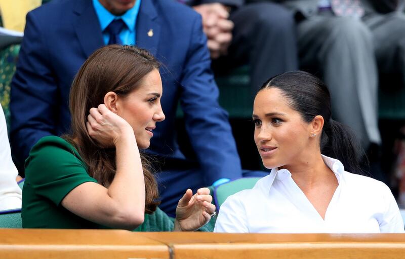 The Duchess of Cambridge and The Duchess of Sussex  on day twelve of the Wimbledon Championships at the All England Lawn Tennis and Croquet Club, Wimbledon. Photo: PA