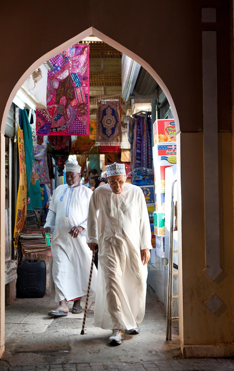 People walk through the narrow winding streets in the historic Mutrah Souk in downtown Muscat, the capital of the Sultanate of Oman on Wednesday, Oct. 12, 2011. (Silvia Razgova / The National)

