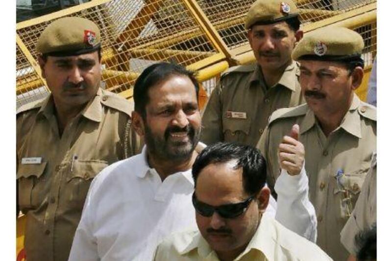 Suresh Kalmadi, the Commonwealth Games chief organiser, second from the left, who was arrested on Monday by India’s Central Bureau of Investigation, arriving for a court hearing in Delhi on Tuesday.