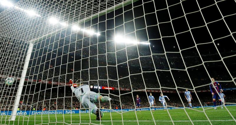 Lionel Messi buries his penalty. Reuters