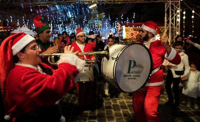 Parade members play music at the Christmas market in Byblos, Lebanon. Reuters