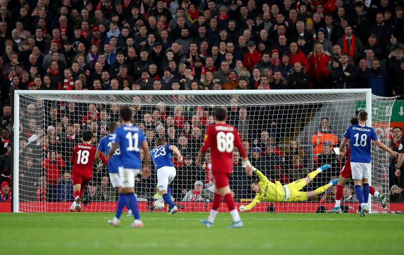 Jordan Pickford of Everton saves a shot from Divock Origi of Liverpool. Getty Images