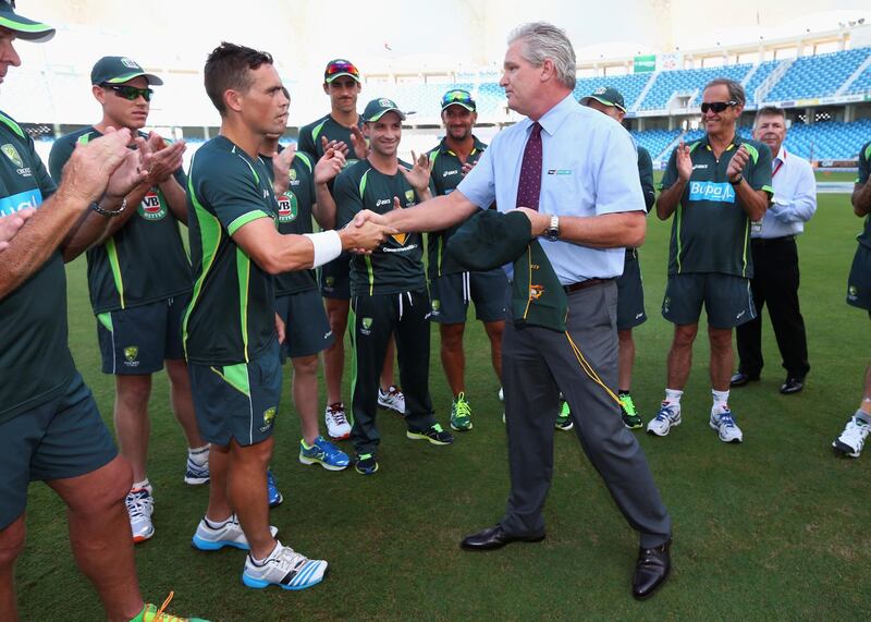 DUBAI, UNITED ARAB EMIRATES - OCTOBER 22:  Steve O'Keefe of Australia receives his Baggy Green cap from Dean Jones during Day One of the First Test between Pakistan and Australia at Dubai International Stadium on October 22, 2014 in Dubai, United Arab Emirates.  (Photo by Ryan Pierse/Getty Images)