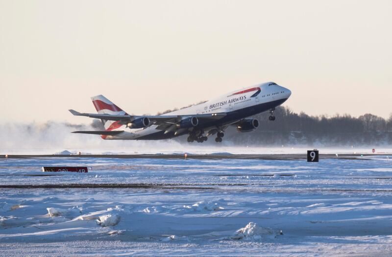 epa08551025 (FILE) - A British Airways 747 (BA238) departs Logan international airport enroute to London Heathrow airport, in Boston, Massachusetts, USA, 06 January 2018 (reissued 17 July 2020). Britain's flagship aircraft carrier British Airways on 16 July confirmed the retirement of its entire Boeing 747 fleet following the devastating impact of the coronavirus pandemic on air travel.  EPA/JOHN CETRINO