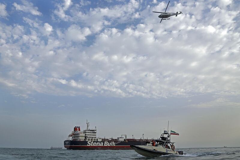 Iranian Revolutionary Guards patrolling around the British-flagged tanker Stena Impero as it's anchored off the Iranian port city of Bandar Abbas.  AFP