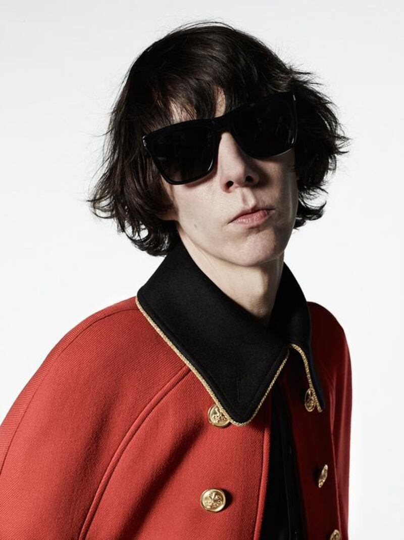 Hedi Slimane has long used military tailoring in his collections. Here he presents a wool jacket, accompanied by brass buttons and gold piping. Courtesy Saint Laurent