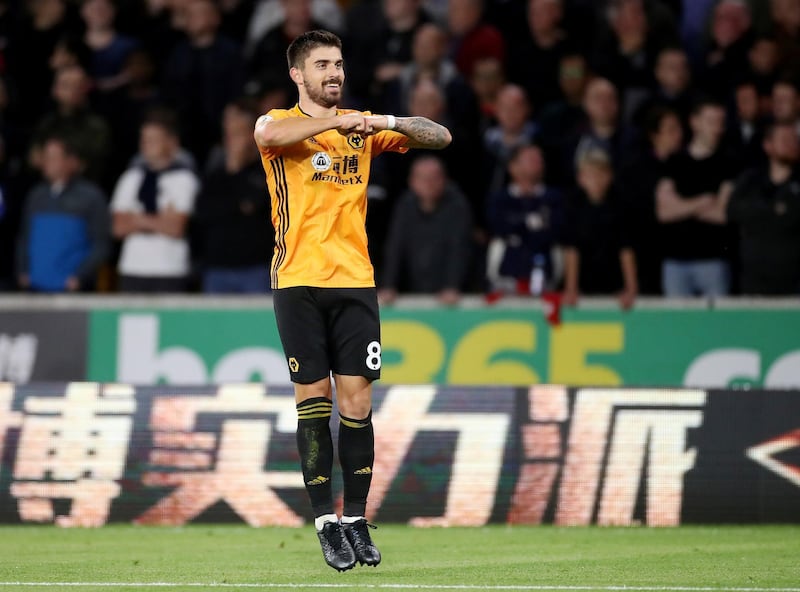Wolverhampton Wanderers' Ruben Neves celebrates scoring the equaliser. AFP