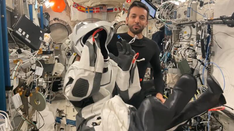 UAE astronaut Sultan Al Neyadi tries on his SpaceX flight suit to ensure it is ready for his departure from the ISS. Photo: Sultan Al Neyadi / social media