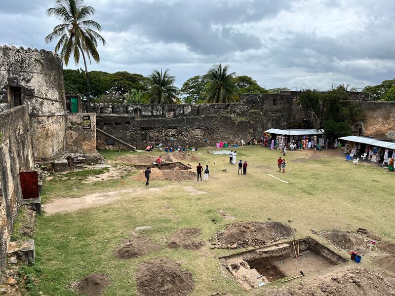 Archaeologists at work inside the Old Fort of Stone Town in Zanzibar. Two trenches were dug to a depth of two metres. Photo: Tim Power