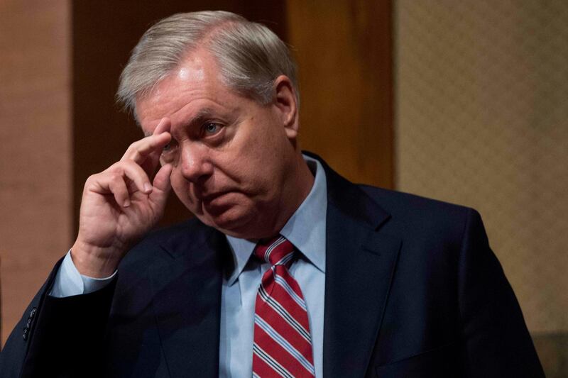 (FILES) In this file photo taken on January 31, 2017, US Senator Lindsey Graham, R-SC, arrives for a mark-up meeting on the nomination of US Senator Jeff Sessions, R- Alabama, to be Attorney General of the Department of Justice on Capitol Hill in Washington, DC.  Senior Republican Lindsey Graham said Sunday, December 30, 2018 that President Donald Trump had promised to stay in Syria to finish the job of destroying the Islamic State group -- just days after announcing he would be withdrawing troops immediately.  / AFP / JIM WATSON
