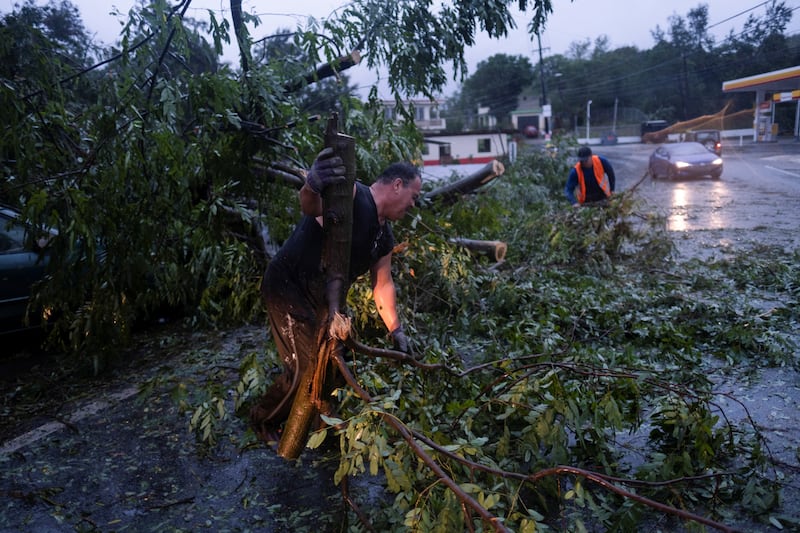 Asphalt was torn from roads and a major road bridge swept away after torrential rain. Reuters