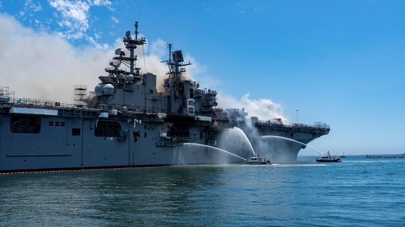 Officers from San Diego harbor police department combat a fire on board the US Navy ship 'USS Bonhomme Richard' at the naval base in San Diego, California, US. Reuters