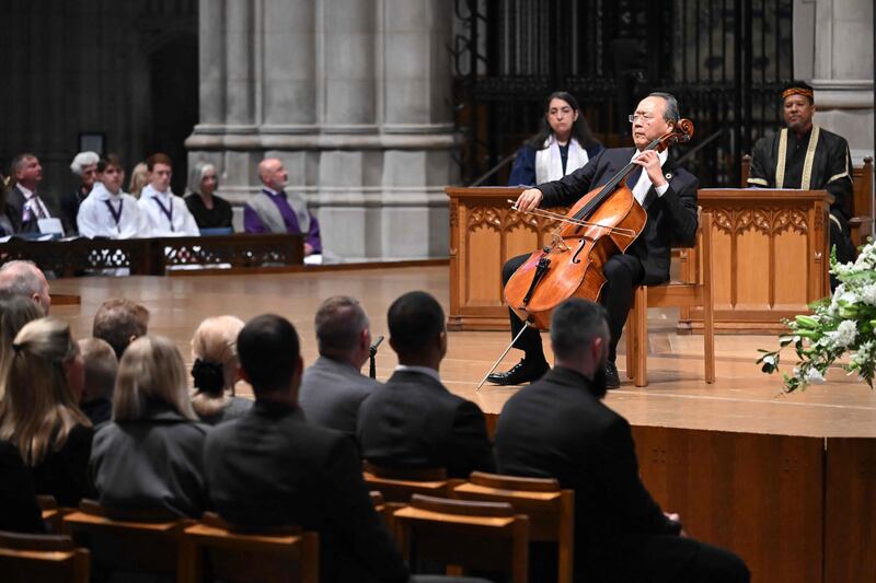 The American cellist Yo-Yo Ma performs at the service in Washington