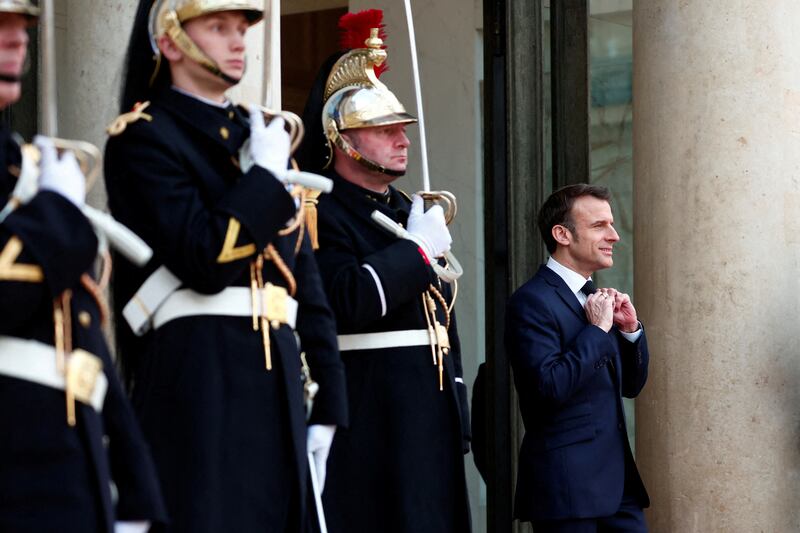 French President Emmanuel Macron prepares for the arrival of Sheikh Tamim for a meeting at the Elysee Palace as part of the emir's two-day state visit to Paris. Reuters