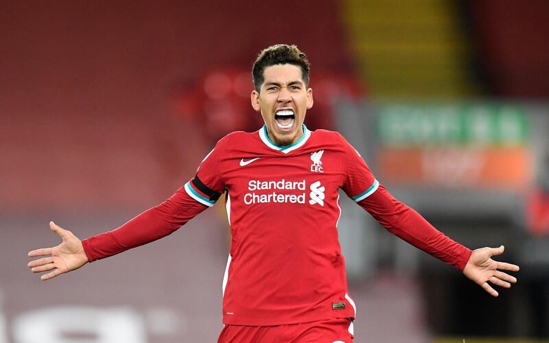 Roberto Firmino celebrates the winner after extending Liverpool's record in the 2-1 win over Tottenham on December 17, 2020. AP