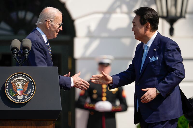 President Joe Biden and South Korea's President Yoon Suk-yeol on the South Lawn of the White House on April 26. AP