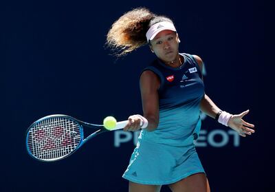 epa07456677 Naomi Osaka of the Japan in action against Yanina Wickmayer of Belgium during their match at the Miami Open tennis tournament in Miami, Florida, USA, 22 March 2019.  EPA/JASON SZENES