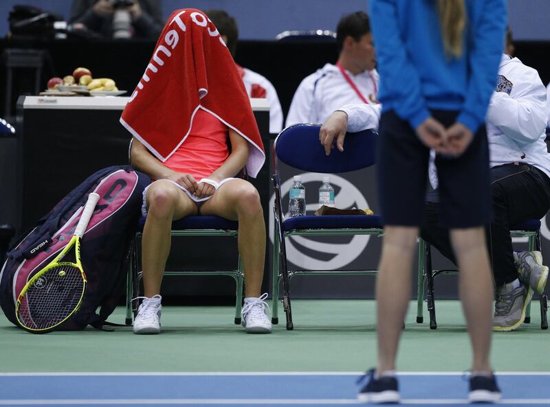 Belarus’ Aliaksandra Sasnovich rests during her Fed Cup tie against Switzerland’s Timea Bacsinszky in Minsk. Tatyana Zenkovich / EPA