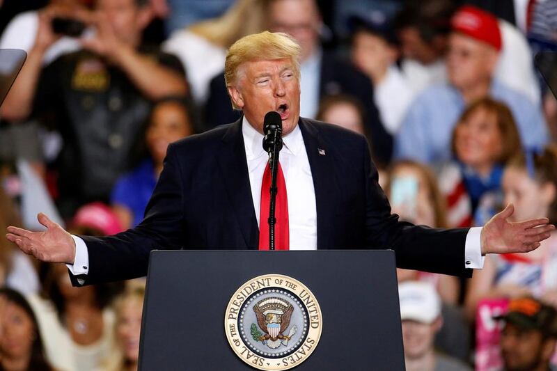 US president Donald Trump appears on stage at a rally in Harrisburg, Pennsylvania, on April 29, 2017.  Carlo Allegri/Reuters