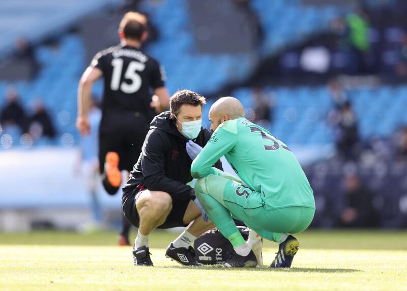 West Ham United's Darren Randolph receives medical attention. Reuters