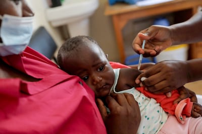 A nurse administers the malaria vaccine to an infant in Kisumu, Kenya. In 2022, more than 600,000 people died from the disease and nearly 250 million new cases were recorded, almost all of them in Africa. Reuters