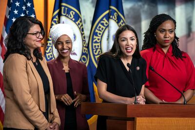 epaselect epa07719406 Democratic Representatives Rashida Tlaib (L), Ilhan Omar (C-L), Alexandria Ocasio-Cortez (C-R), and Ayanna Pressley (R) speak about President Trump's Twitter attacks against them in the US Capitol in Washington, DC, USA, 15 July 2019. Without identifying them by name, President Trump tweeted that the minority lawmakers should 'go back' to their countries. Three of the four freshman congresswomen are natural-born US citizens.  EPA/JIM LO SCALZO