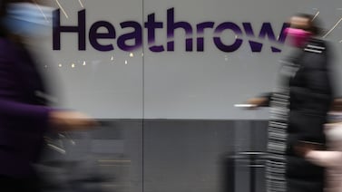 Travellers pass through the international arrivals gate at Terminal 5. A record 18.5 million passengers passed through Heathrow in the first quarter of 2024. Getty Images