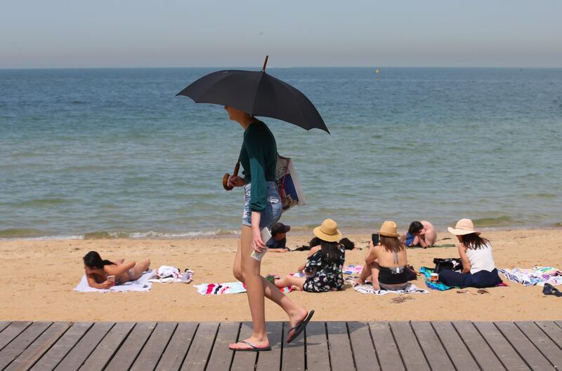 People flock to St Kilda beach, south of Melbourne, as a heatwave sweeps across the state of Victoria, Australia.  EPA