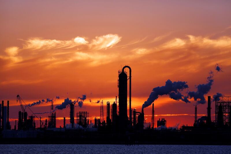 Emissions rise from an oil refinery at sunset in Texas City, Texas, U.S., on Thursday, Feb. 16, 2017. Asia's energy importers will benefit from more opportunities for arbitrage, supply diversification if U.S. President Donald Trump's pro-energy policies drive meaningful upsurge in U.S. crude, LNG exports, BMI Research reports. Photographer: Luke Sharrett/Bloomberg