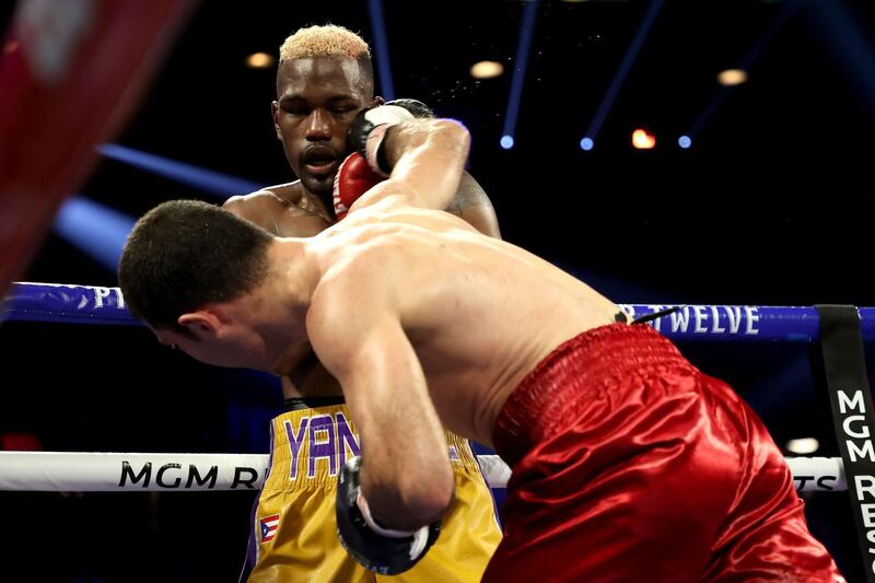 Petros Ananyan (R) punches Subriel Matias during their super lightweight bout at MGM Grand Garden Arena in Las Vegas.  AFP