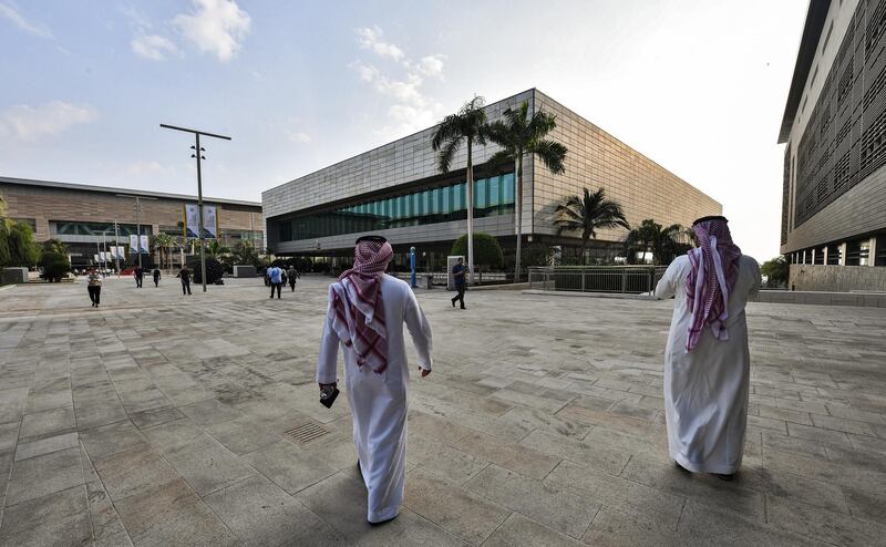 Men walk at the campus of the King Abdullah University of Science and Technology (KAUST), in Saudi Arabia's western Red Sea town of Thuwal, about 80 kilometres north of Jeddah, on December 12, 2019. (Photo by GIUSEPPE CACACE / AFP)