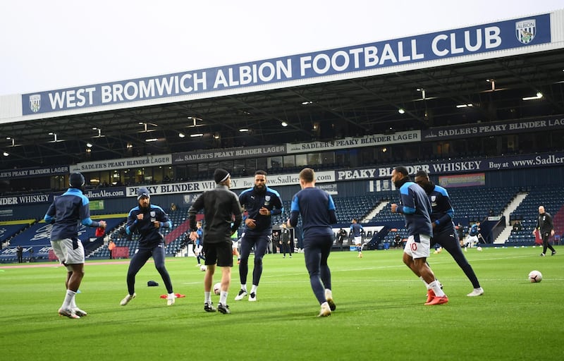 WEST BROMWICH, ENGLAND - OCTOBER 19: West Bromwich Albion players warm up prior to the Premier League match between West Bromwich Albion and Burnley at The Hawthorns on October 19, 2020 in West Bromwich, England. Sporting stadiums around the UK remain under strict restrictions due to the Coronavirus Pandemic as Government social distancing laws prohibit fans inside venues resulting in games being played behind closed doors. (Photo by Laurence Griffiths/Getty Images)