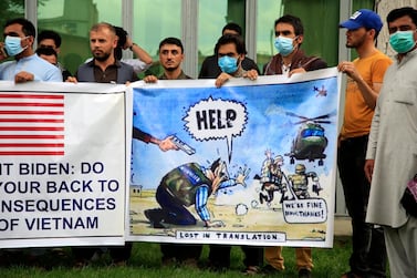Former Afghan interpreters hold banners during a protest against the US government and Nato in Kabul. AP
