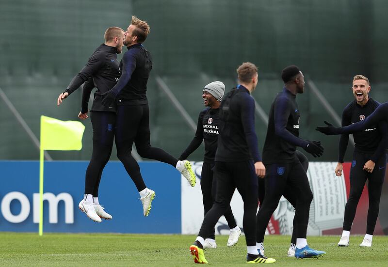 Harry Kane, Eric Dier and their teammates attend a training session. Lee Smith / Reuters