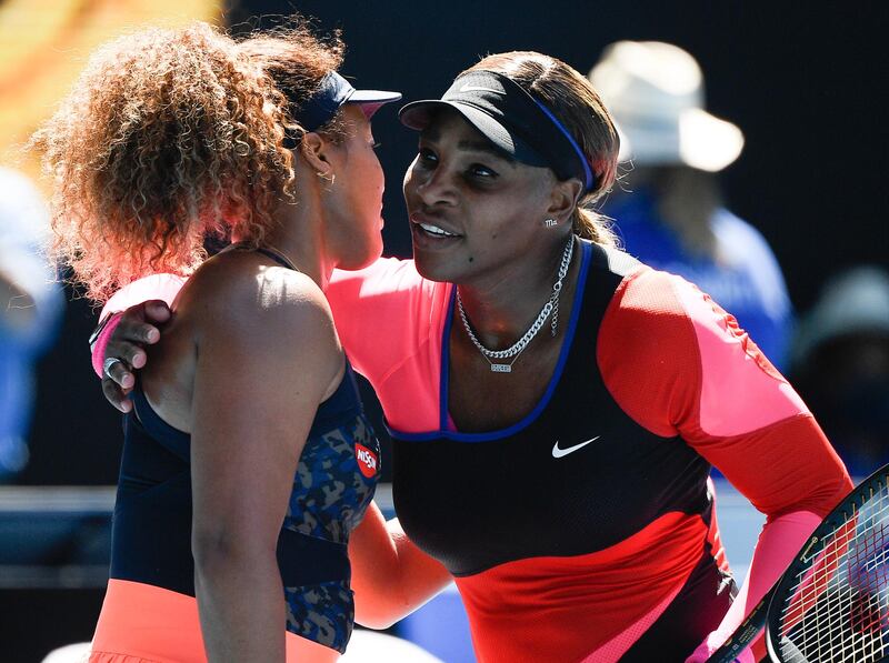 Japan's Naomi Osaka, left, is congratulated by Serena Williams. AP