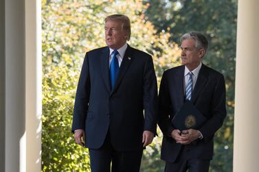 US President Donald Trump and Jerome Powell. The Federal Reserve is set to "vaccinate" the US economy against a slowdown with the first interest rate cut in a decade. AFP