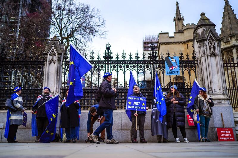 LONDON, ENGLAND - JANUARY 09: Anti-Brexit activists protest outside the Houses of Parliament on January 9, 2020 in London, England. MPs are set to vote on the Withdrawal Agreement Bill that codifies Boris Johnson's withdrawal treaty with the EU, keeping the country on-track for a January 31 Brexit. (Photo by Peter Summers/Getty Images)