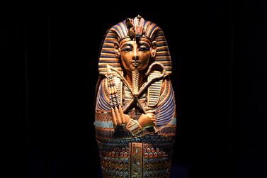 A gold inlaid canopic coffinette of Tutankhamum is displayed at 'Tutankhamun: Treasures of the Golden Pharaoh' at the Saatchi Gallery in London. EPA 