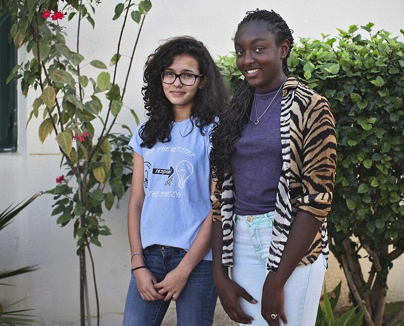 Lamia Makkar, left, and Tasneem Zarroug, from the Abu Dhabi Community School. They worked to fund trips to aid community projects in Cambodia and in Haiti during the summer holidays. Lee Hoagland / The National